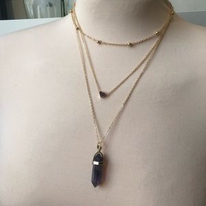 Multi layered necklace with purple glass crystal